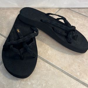 BNWOT Teva slide on sandals.  Black